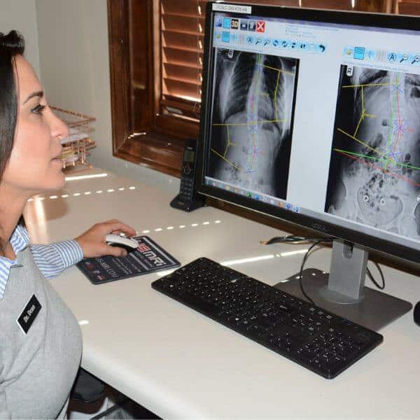 Dr. Dean analysing digital x-rays
